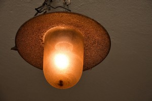 Tungsten light bulb inside rusty old holder lightbulb 300x199 Utility bills: highest and the lowest nationwide
